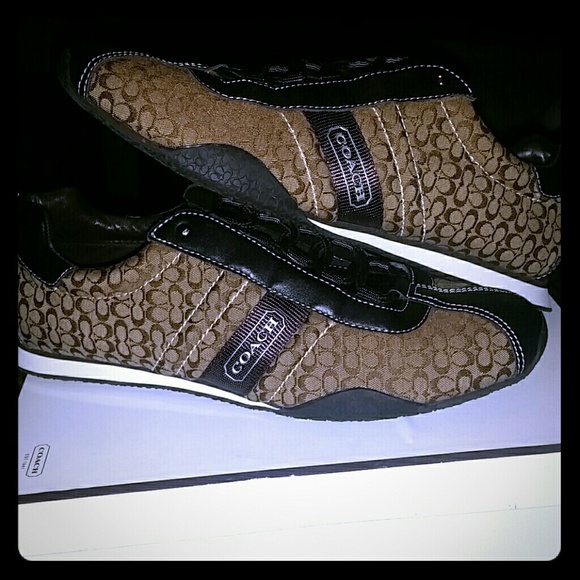 Coach shoes size 9.5 in women . Never worn