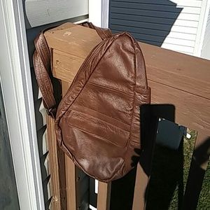 Genuine leather mini over the shoulder backpack