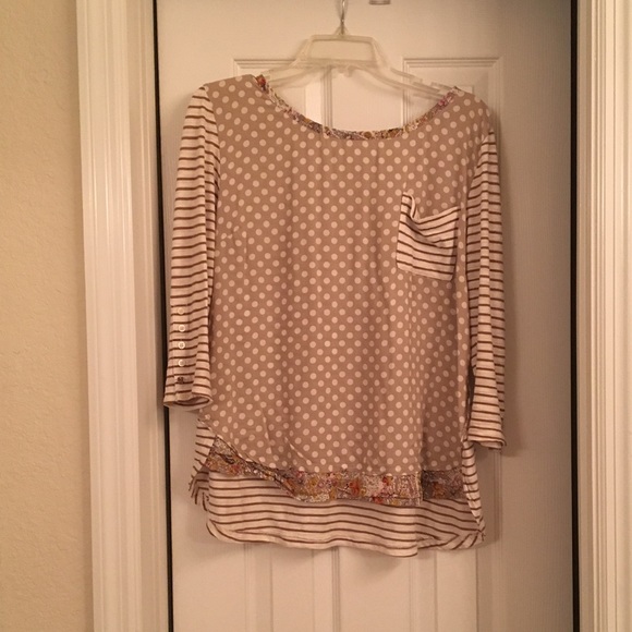 Anthro long sleeve with floral detail.