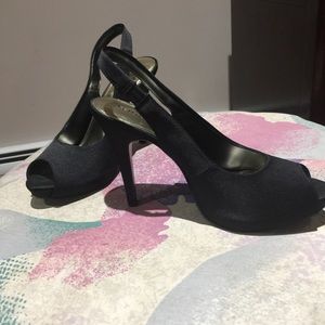 Brand new black satin peep toe shoes. Size 8