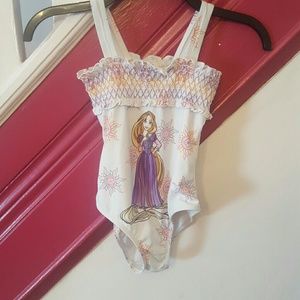 Girls Disney Rapunzel swimsuit, size medium (7/8)