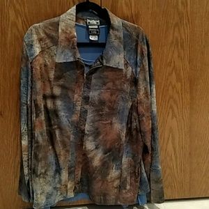 Multi colored blazer with blue top and jewelry