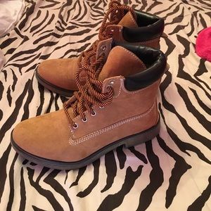 Worn once girly timberland style shoes