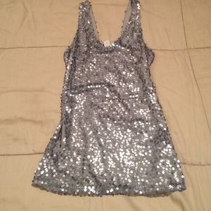 Silver colored sequin tank top.