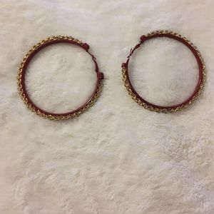 Red and gold hoop earrings.