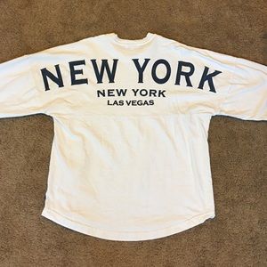 New York New York white long sleeved tee shirt.