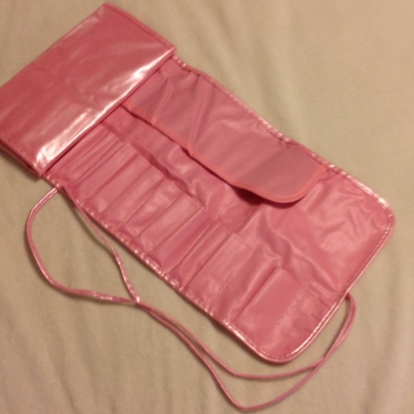 Make-up brush holder- fold out. Holds 34 brushes