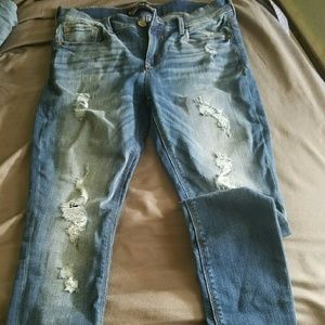 Express distressed mid wash leggings