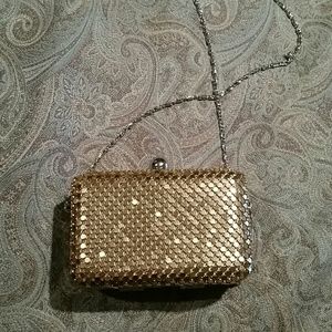 Gold sequined clutch