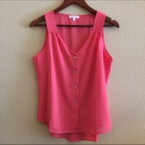 Sugar Rain sleeveless, button down blouse.