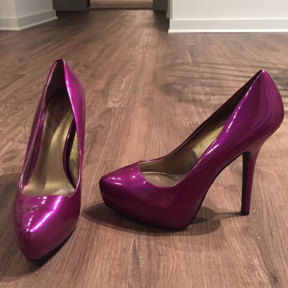 Fergie plum colored high heels size 10