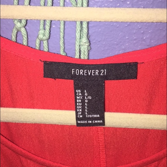 Flowy dress with open sides - Picture 3 of 3