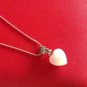 Rose Quartz Pendant. Silver necklace included.