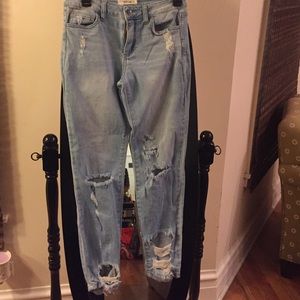 Distressed ankle length jeans
