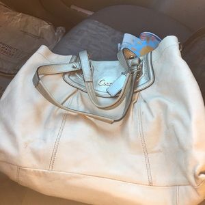 Coach pearl color is used condition too used