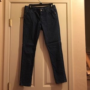 Blue jeans with white polka dots