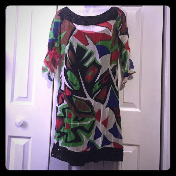 Colorful sheer cache dress with black sequins slip
