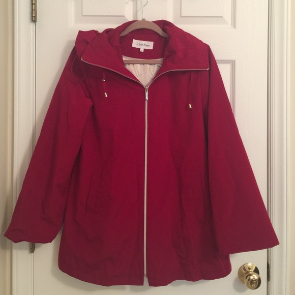 Red Calvin Klein raincoat