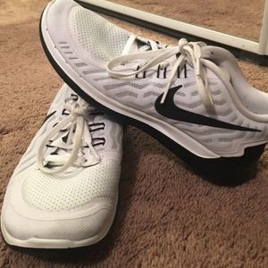 White and black Nike Free Runs