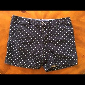 Navy blue shorts with light blue polka dots