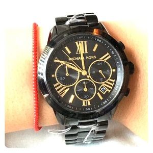 Michael Kors Unisex black watch.