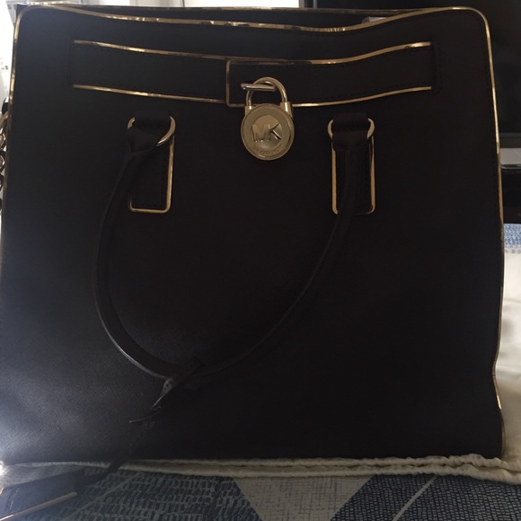 Michael Kors large Hamilton brown/gold handbag.