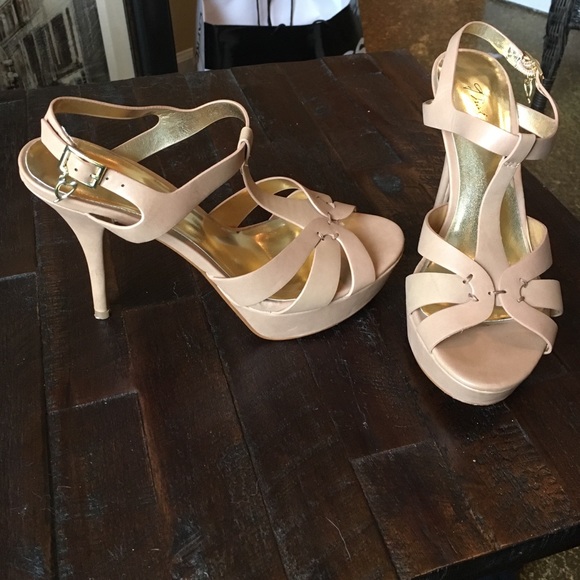 Tan pumps gently worn