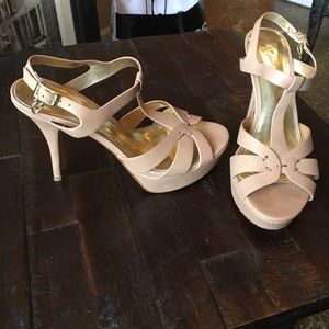 Tan pumps gently worn