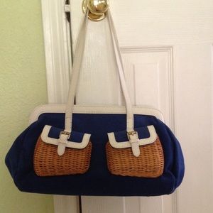 Savoy purse with wicker pockets. Savoy purse with wicker pockets.