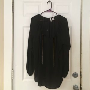 Black tunic with gold chain embellishment