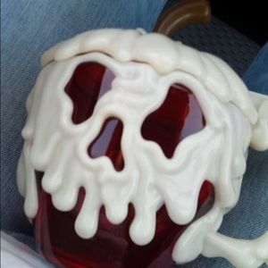 Disney poison apple mug. It glows in the dark.