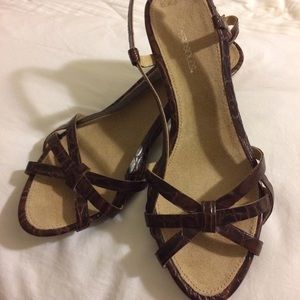 Barely worn brown aerosole sandals.