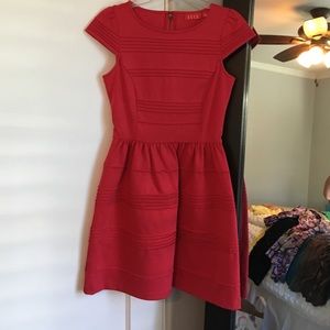 Red cocktail dress.  Mini length.