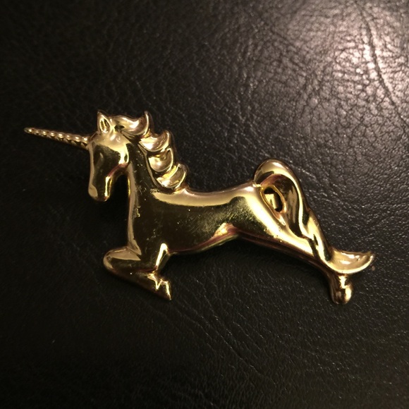 Vintage gold tone unicorn brooch