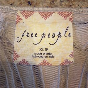 Never worn, long sleeve Free People top.