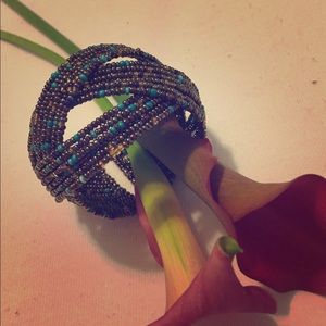 Brown and turquoise beaded cuff bracelet.