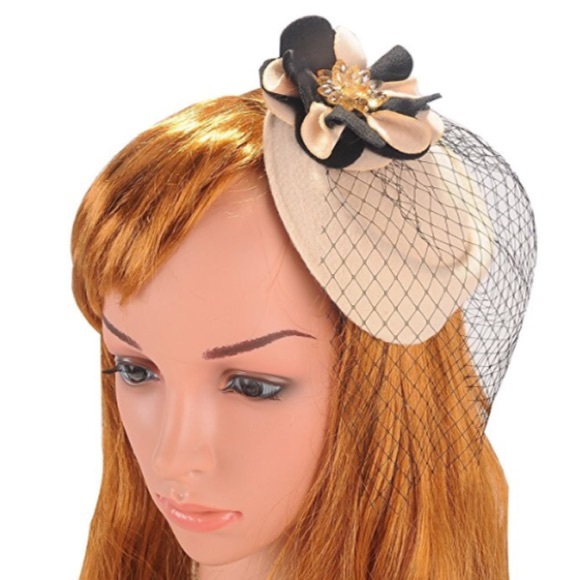 Vintage off white pillhat with fish net veil