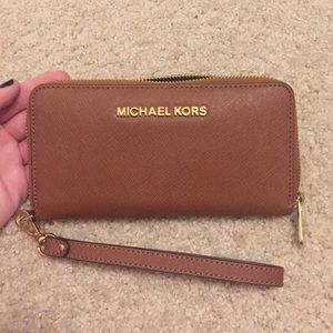 Michael Kors brown wristlet/wallet