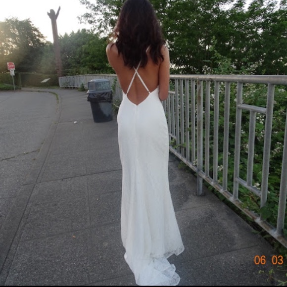 fame and partners white gown