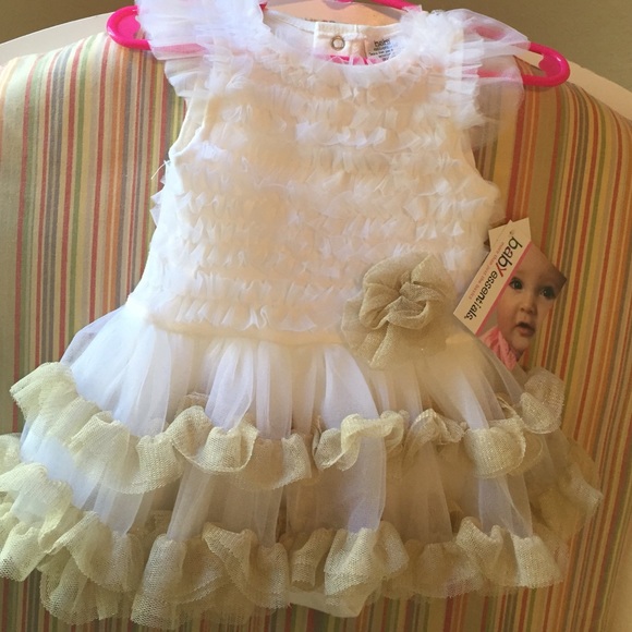 White and gold ruffle dress