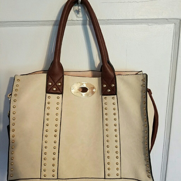 Womans studded handbag