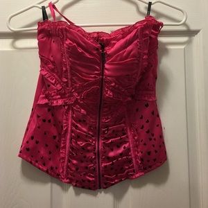 Bebe hot pink crop top, with black heart accents