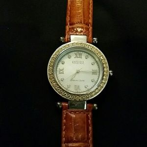 STERLING SILVER WATCH WITH 6 LEATHER BAND