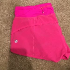 Hot pink lululemon running shorts