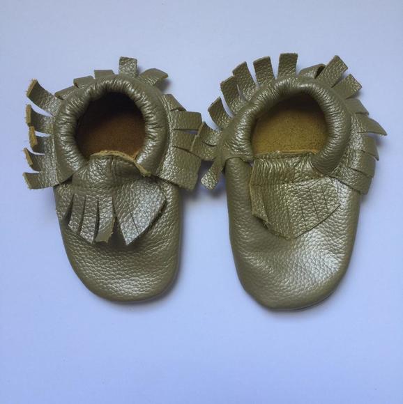 Gold moccasin shoes