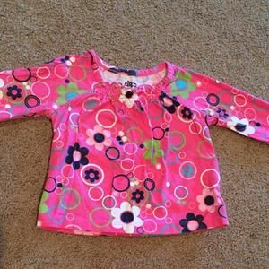 Long sleeved pink blouse