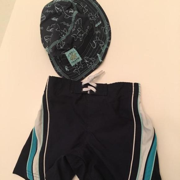 Swim trunks and sun hat