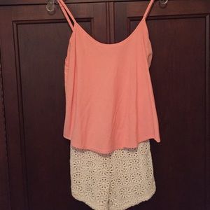 Coral and crochet lined romper