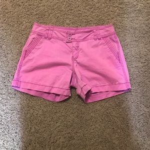 Maurice's purple shorts