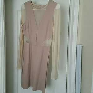 Nude body con dress with sheer sleeves and cut out